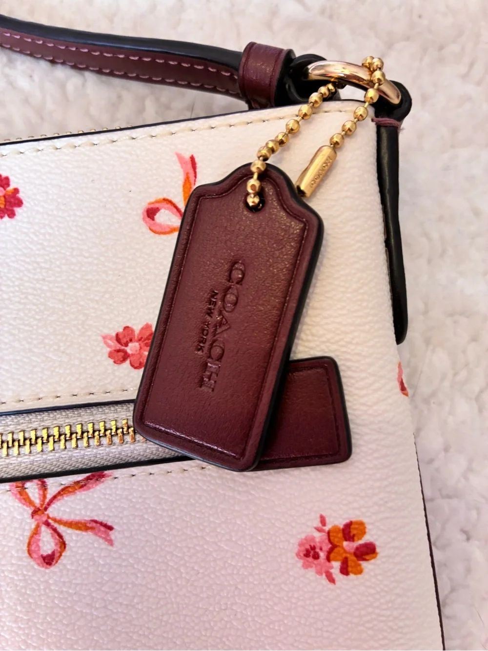 Coach Cream Crossbody with Coral Floral & Bow Print
